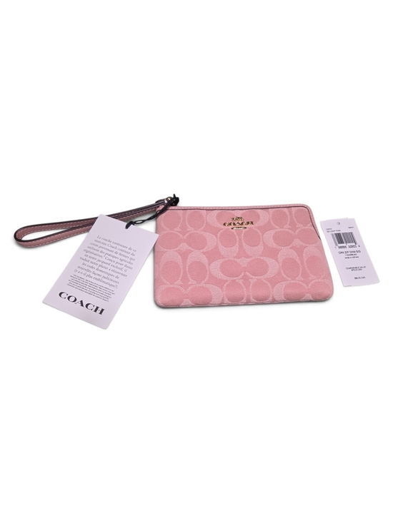Coach Handbags - Coach Pink Denim Wristlet with Gold Logo